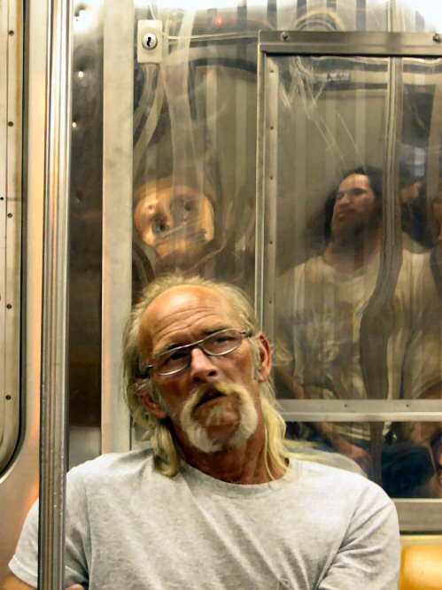 Buttcrack Mike on the D train - twisted reflection is me