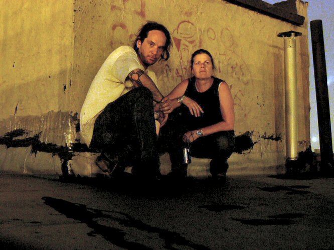 John & Rayna pulling tough poses on my roof